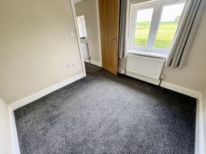 Bedroom Three- click for photo gallery